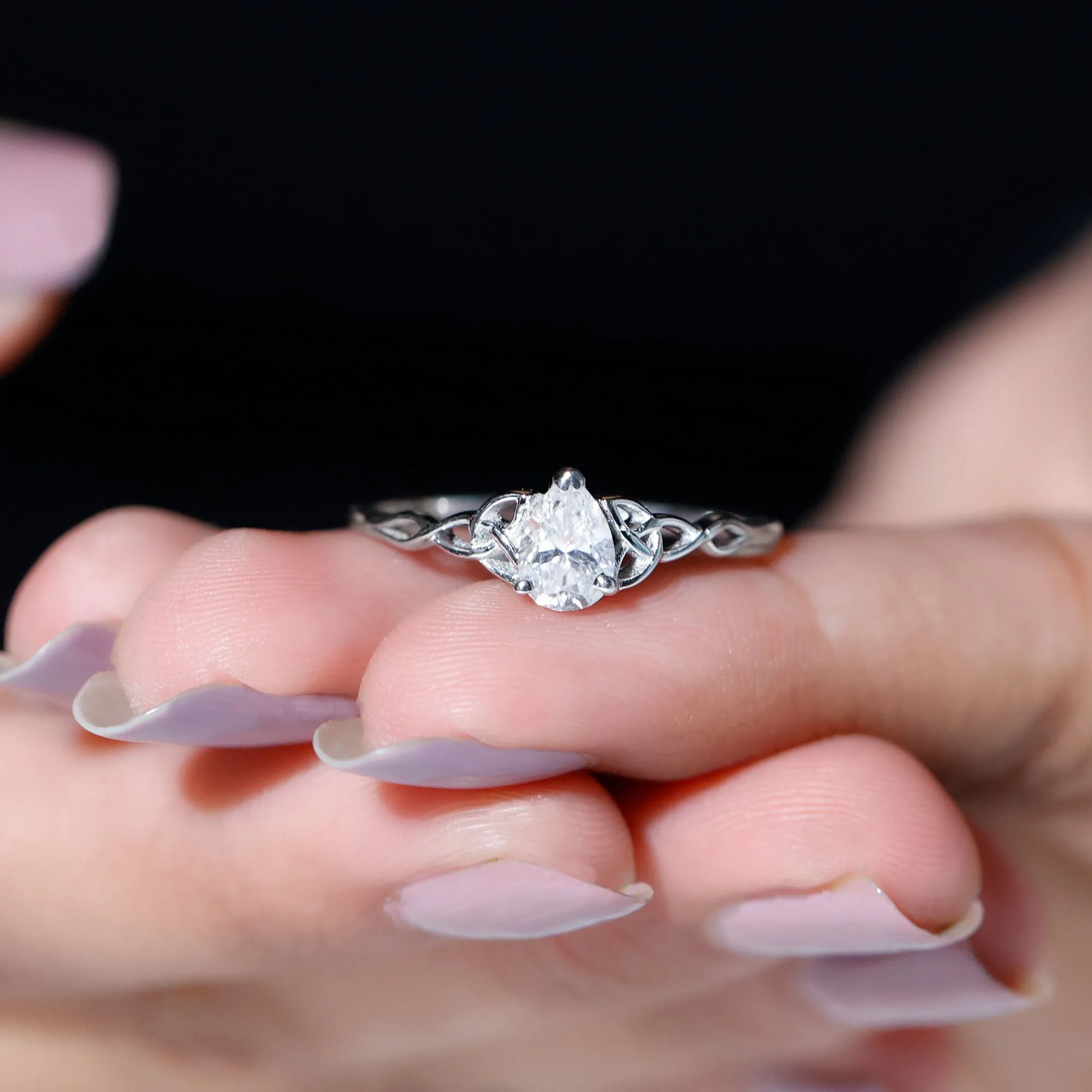 5X7 MM Pear Cut Moissanite Solitaire Ring with Celtic Detailing