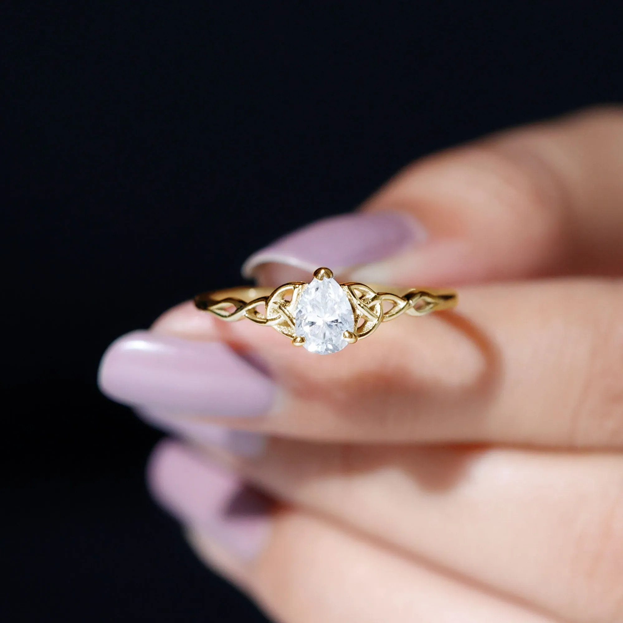 5X7 MM Pear Cut Moissanite Solitaire Ring with Celtic Detailing