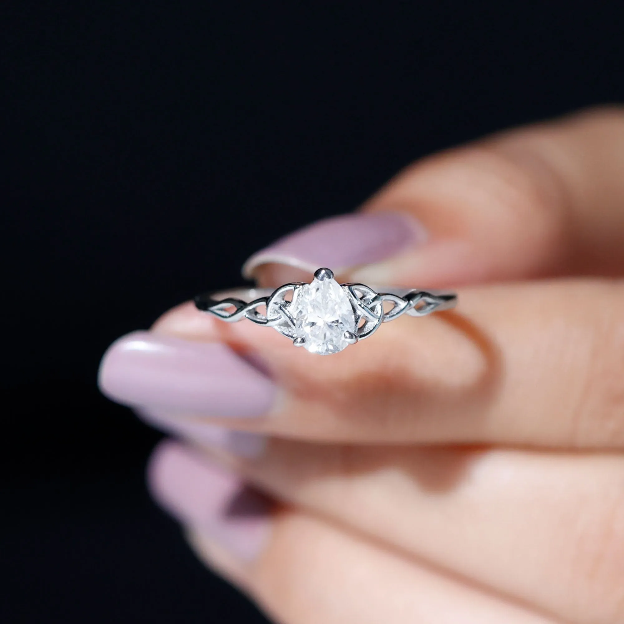 5X7 MM Pear Cut Moissanite Solitaire Ring with Celtic Detailing