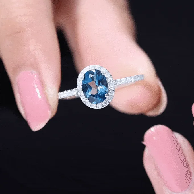 8X6 MM Oval Cut London Blue Topaz Solitaire with Diamond Side Stone Ring