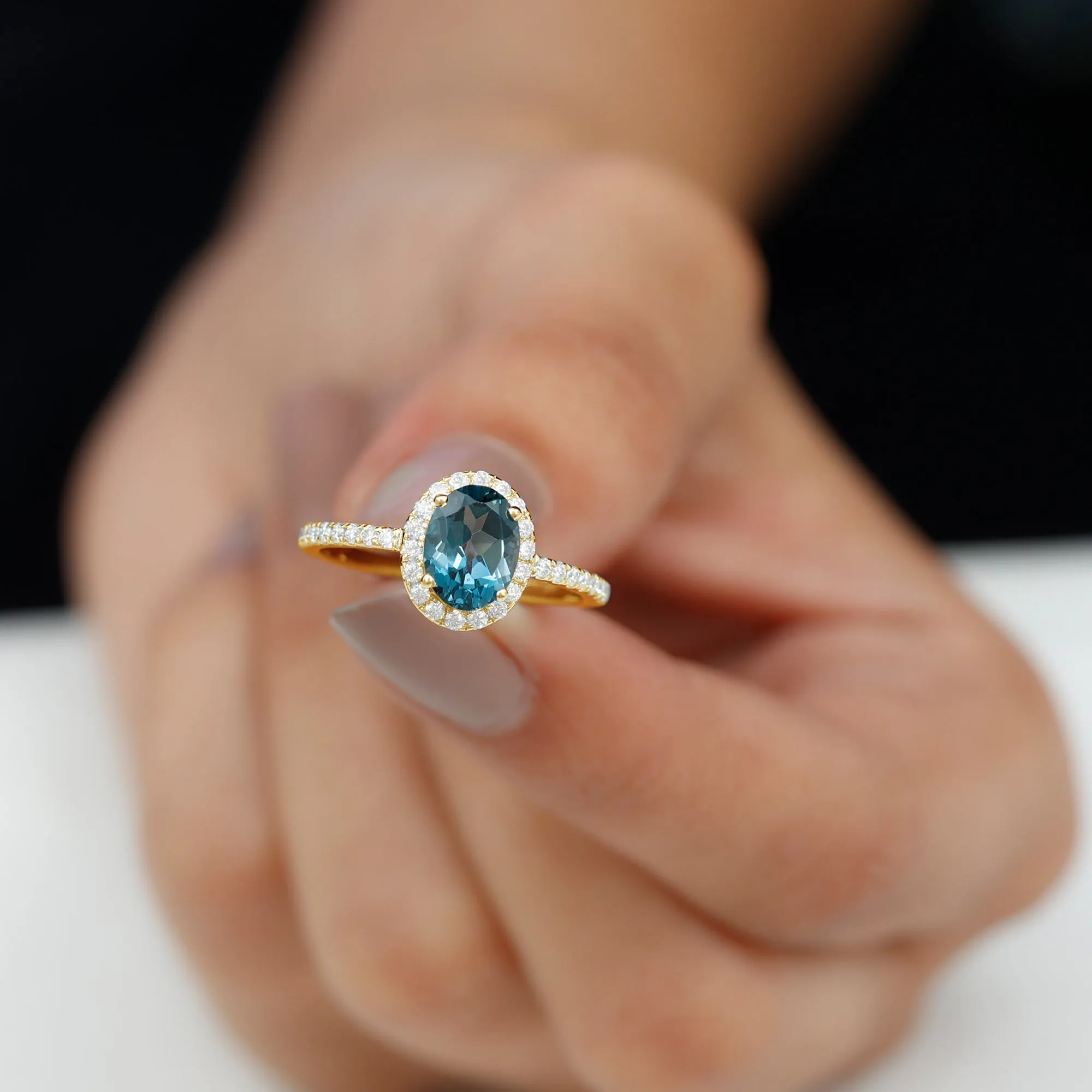 8X6 MM Oval Cut London Blue Topaz Solitaire with Diamond Side Stone Ring