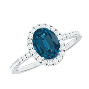 8X6 MM Oval Cut London Blue Topaz Solitaire with Diamond Side Stone Ring