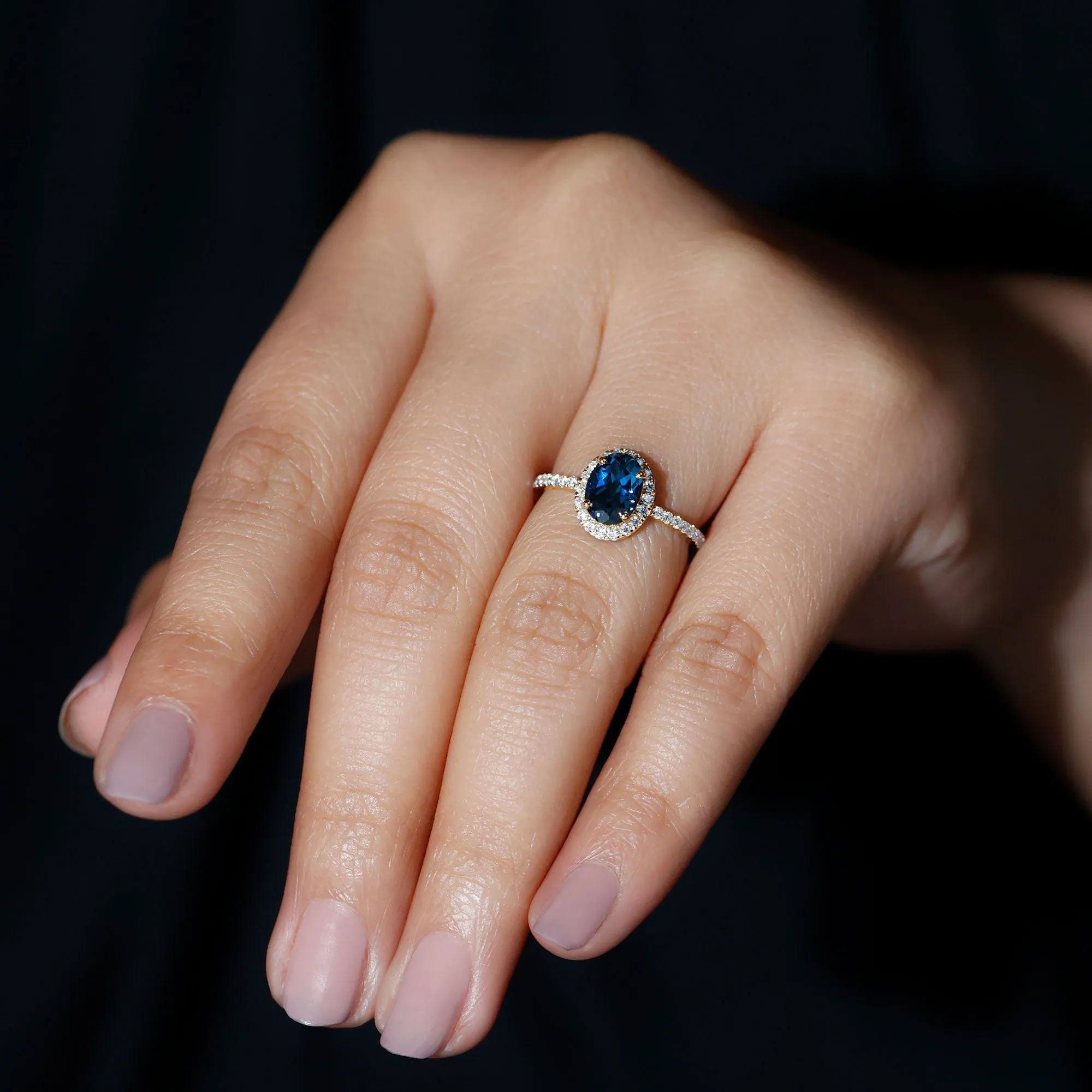 8X6 MM Oval Cut London Blue Topaz Solitaire with Diamond Side Stone Ring