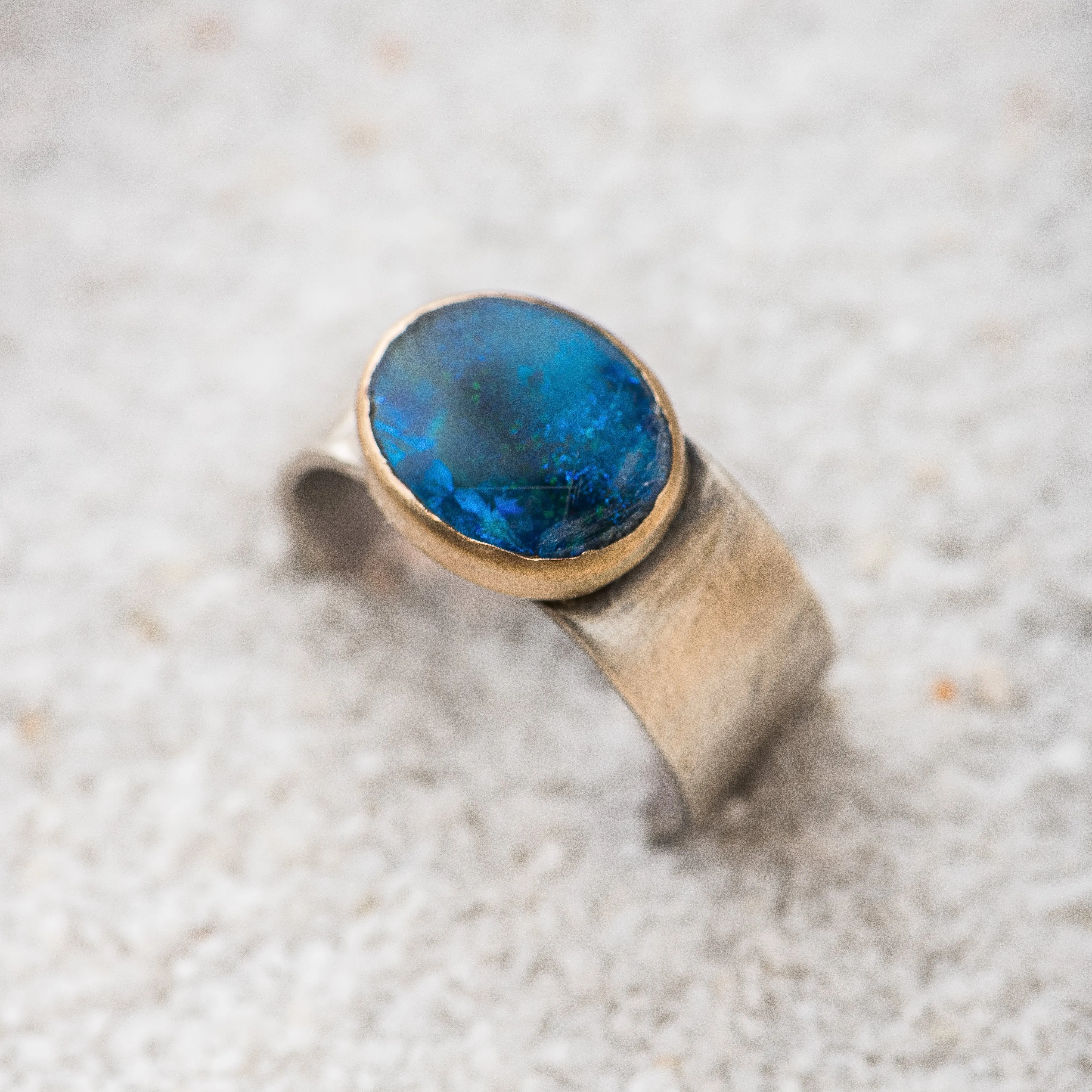 Australian Opal Oval Ring with 14k Gold Bezel on Wide Hammered Band
