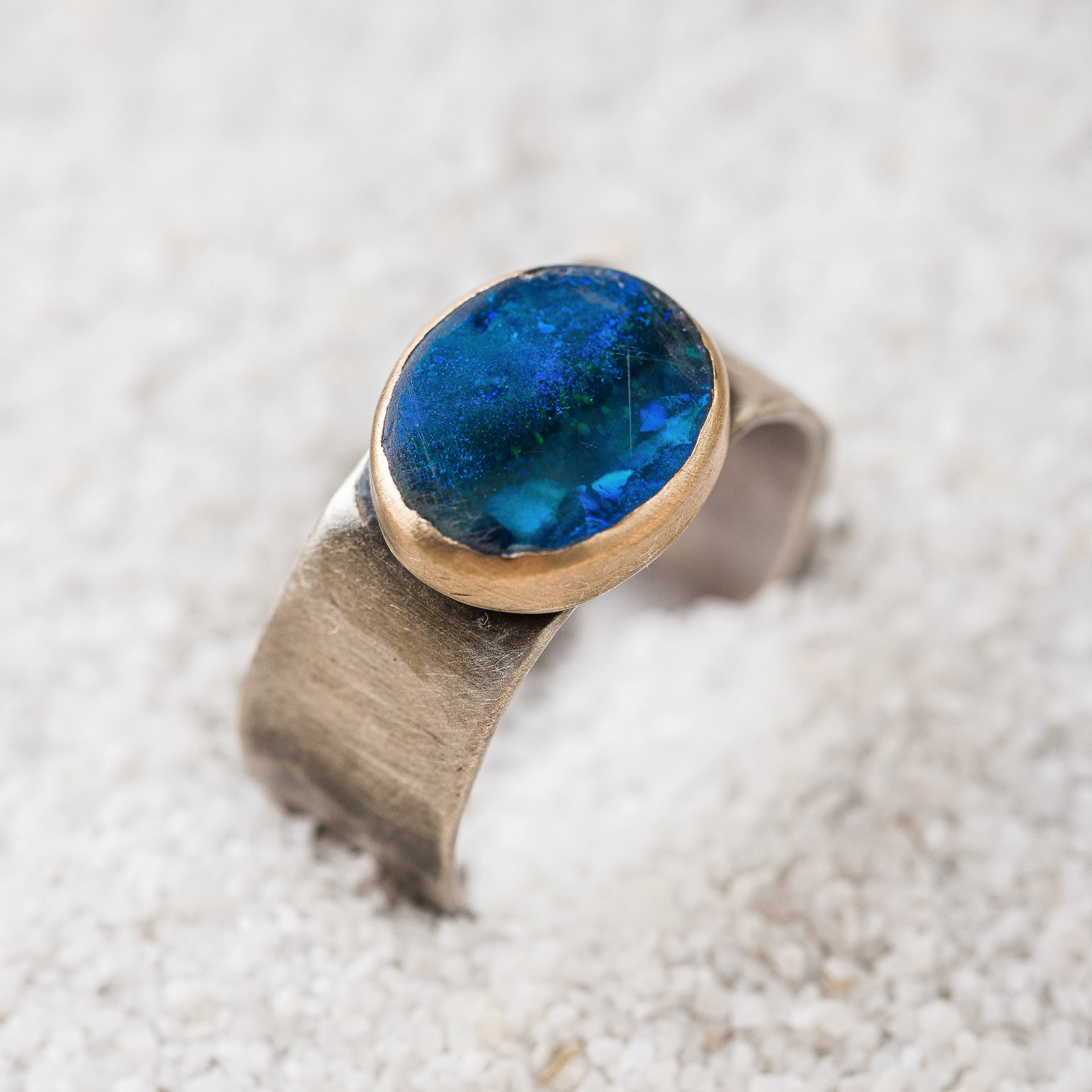 Australian Opal Oval Ring with 14k Gold Bezel on Wide Hammered Band