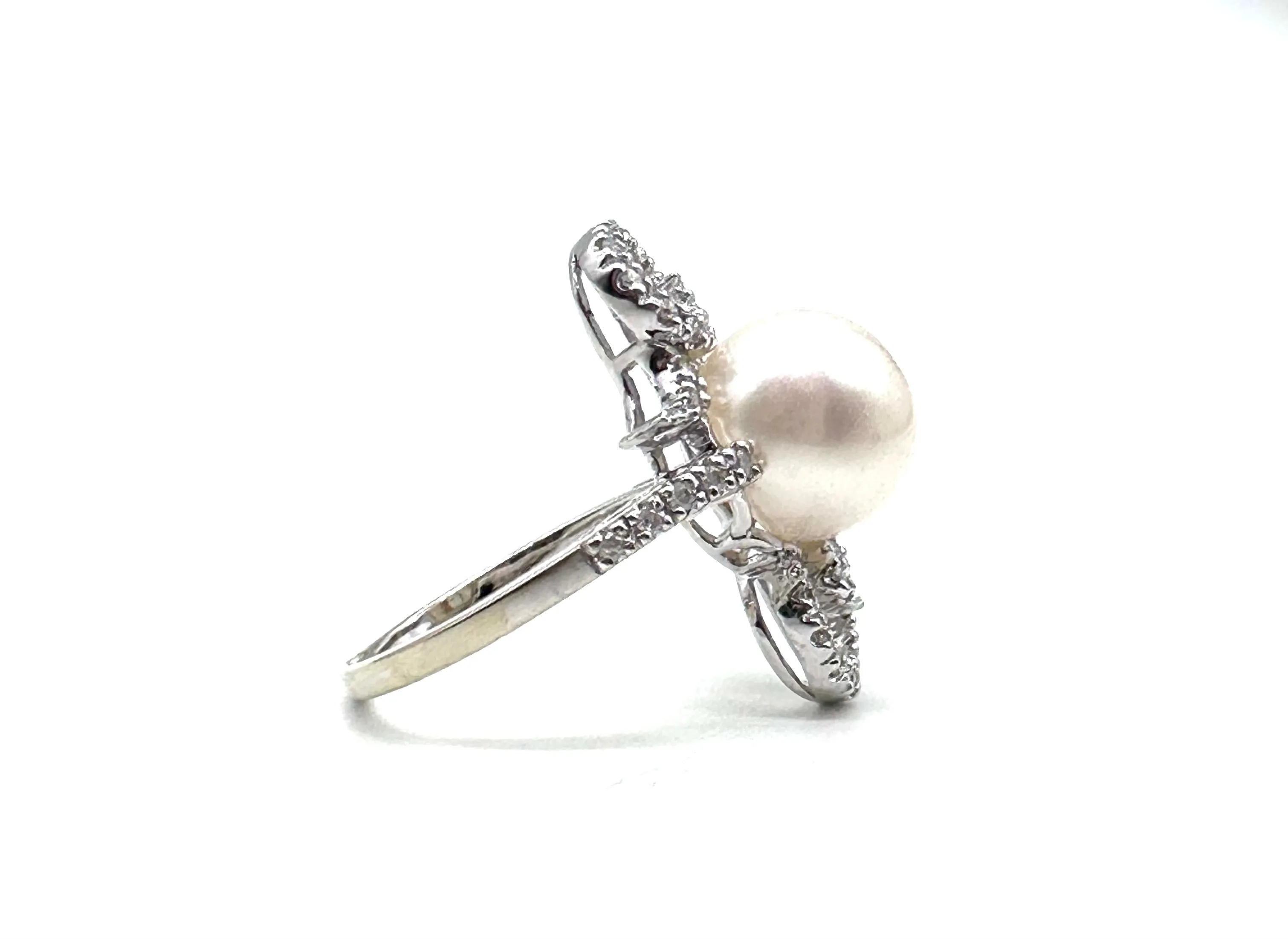 Pearl and diamond swirl ring